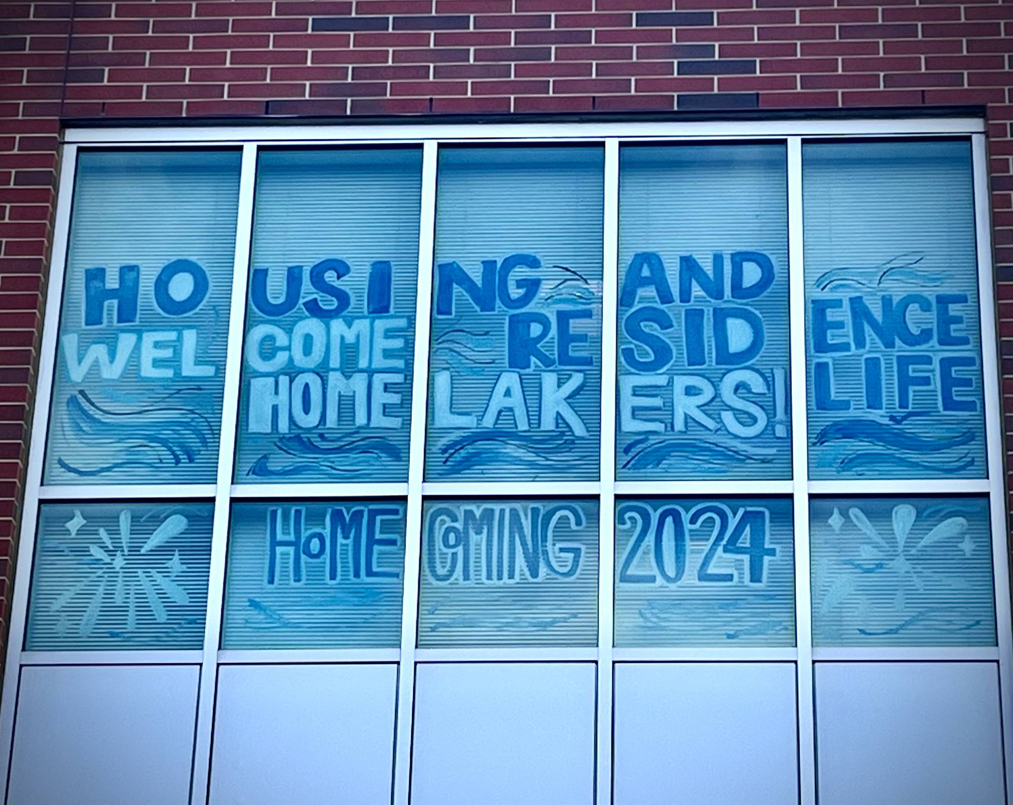 Housing and Residence Life window decorating